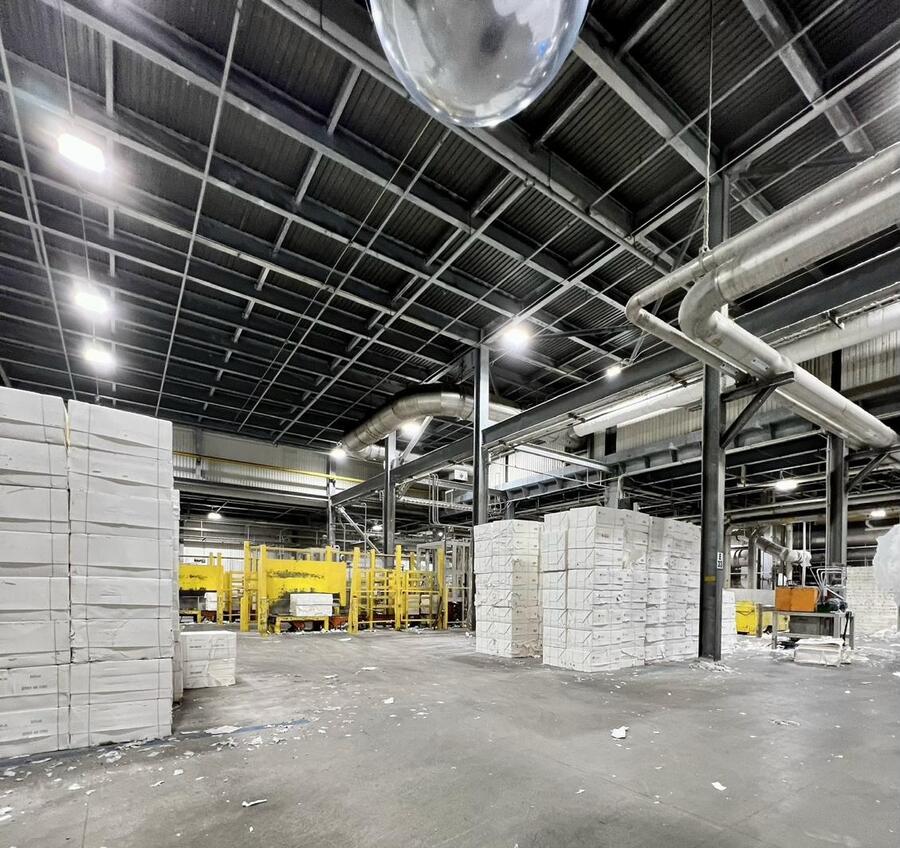 Same industrial facility after eneroi American-made LED retrofit - bright uniform coverage